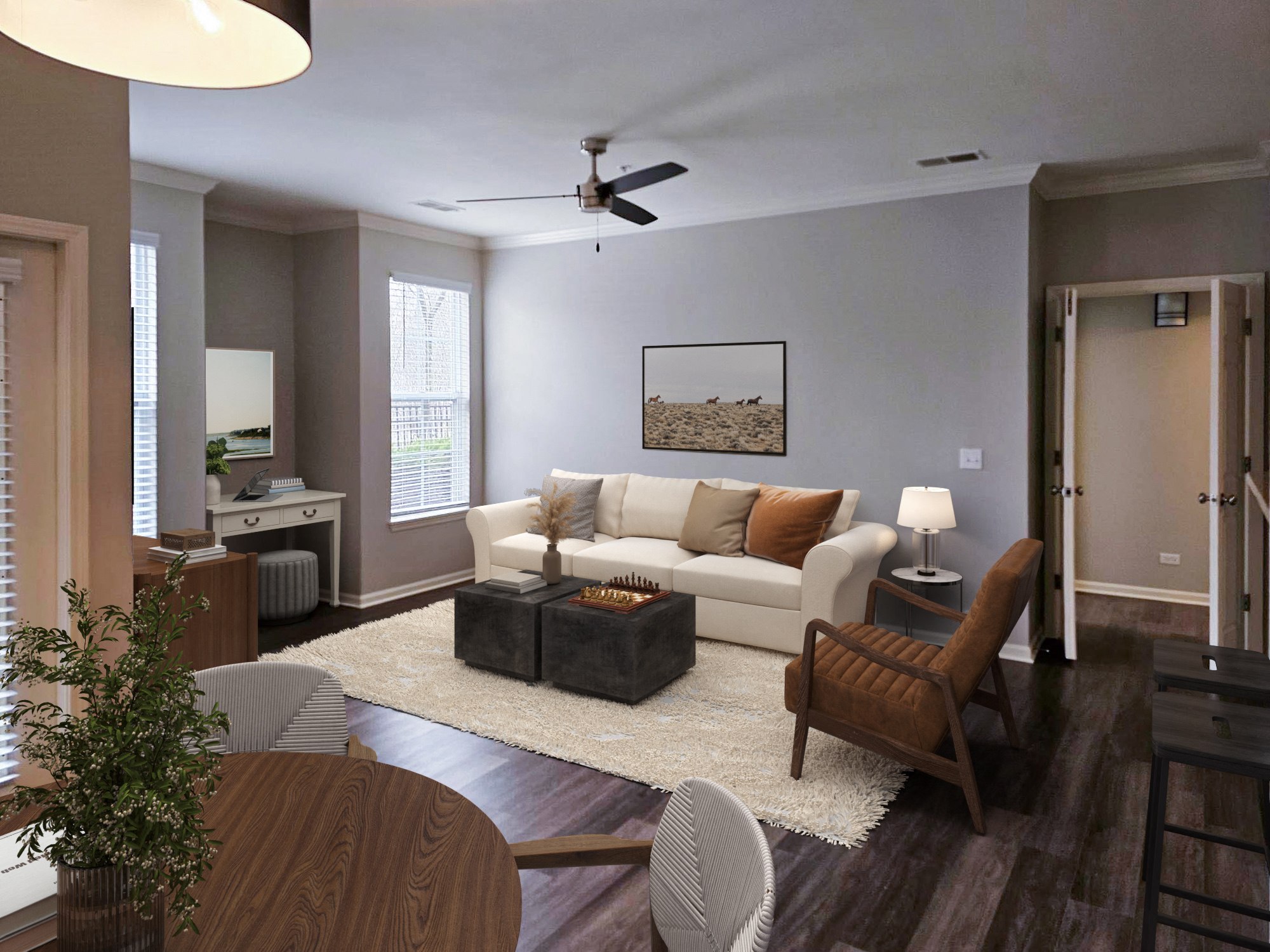 A spacious living room with an adjacent dining area.